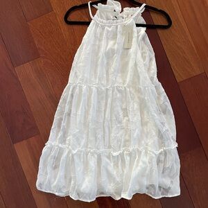 Francesca’s size Large, nwt never worn. White dress.